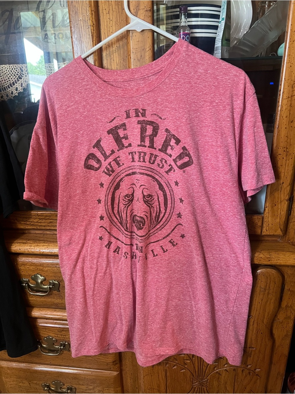 Ole Red 'In Ole Red We Trust' Unisex Heather Red Graphic Tee.